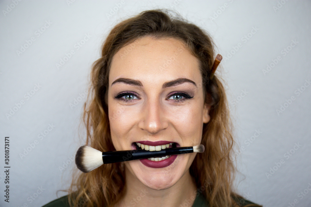 Portrait, beautiful girl, make-up, with smile posing on white background, makeup, powder, eye shadow, mascara, lipstick, eyeshadow Portrait, beautiful girl, make-up, with smile posing on white background, makeup, powder, eye shadow, mascara, lipstick, eyeshadow
