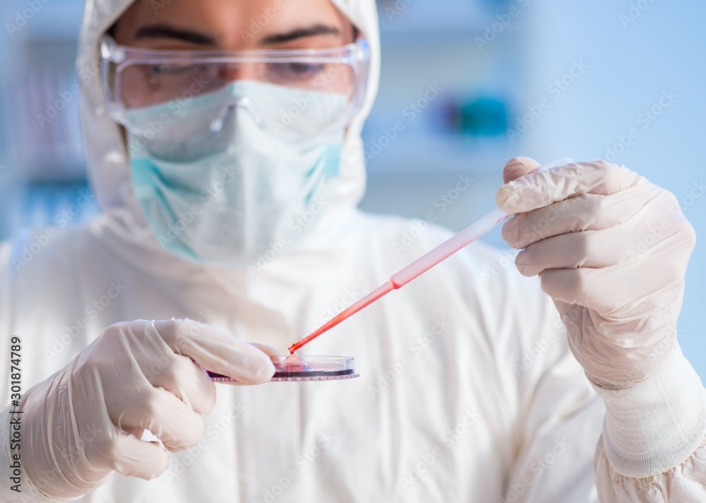 Lab assistant testing blood samples in hospital Lab assistant testing blood samples in hospital