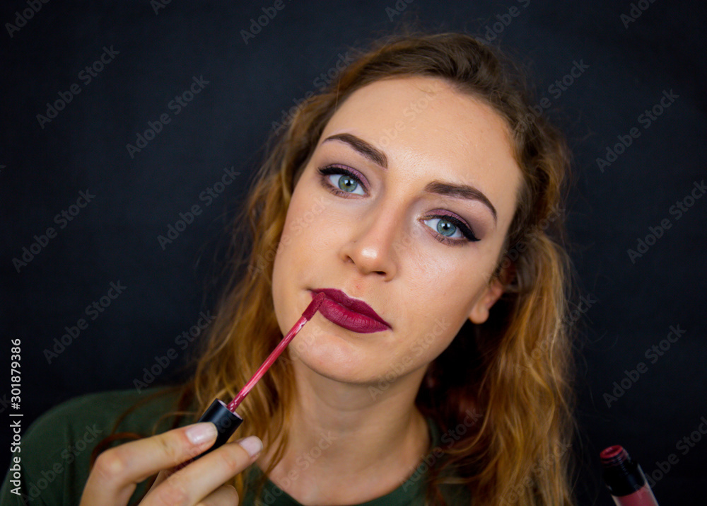 Portrait, beautiful girl, make-up, with smile posing on black background, makeup, powder, eye shadow, mascara, lipstick, eyeshadow Portrait, beautiful girl, make-up, with smile posing on black background, makeup, powder, eye shadow, mascara, lipstick, eyeshadow