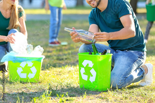 People gathering garbage ou...