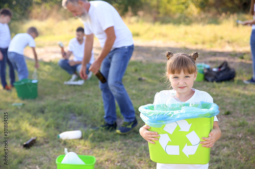 People gathering garbage ou...