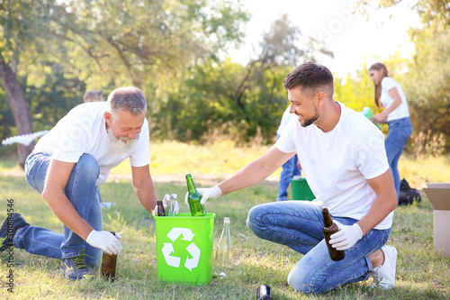 People gathering garbage ou...