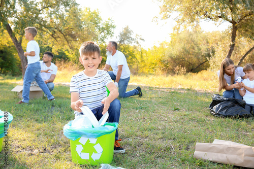 People gathering garbage ou...