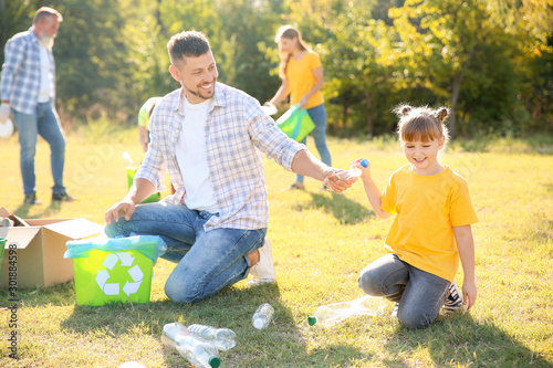 People gathering garbage ou...