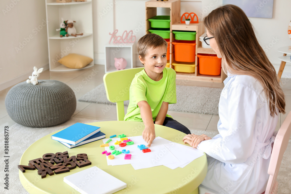 Fototapeta premium Cute little boy at speech therapist office