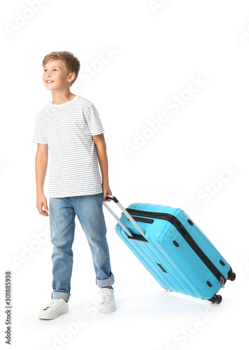 Cute little boy with suitca...