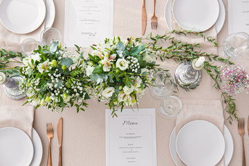 Beautiful table setting for wedding celebration in restaurant