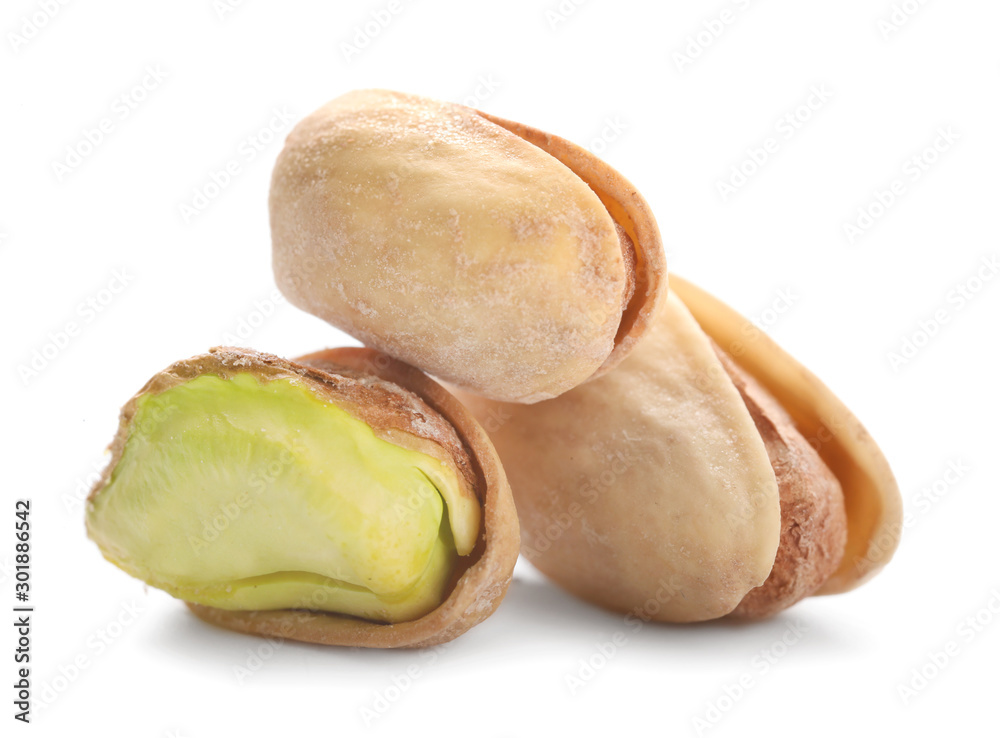 Tasty pistachio nuts isolated on white Tasty pistachio nuts isolated on white