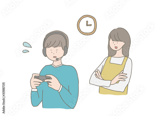 ゲームする子どもに注意する親
