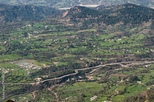 Aerial drone shot of hilly terrains in Himalayan mountain area. Natural beauty concept © PhotoPooja