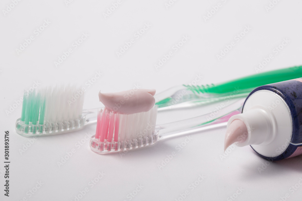 Toothpaste and toothbrush closeup. Dental care. Toothpaste and toothbrush closeup. Dental care.