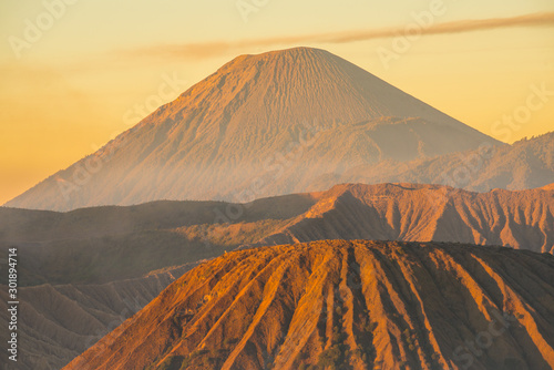 Scenery view of Mount Semeru volcano at dawn. Semeru, the highest volcano on Java, and one of its most active volcano in Indonesia. photo