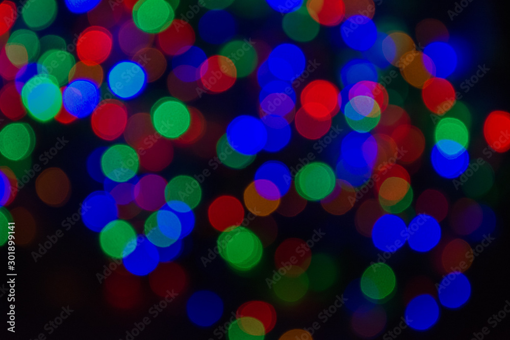 Colorful trendy festive background of blurry lights. Abstract Blurry Background Bokeh. Defocused, soft focus.