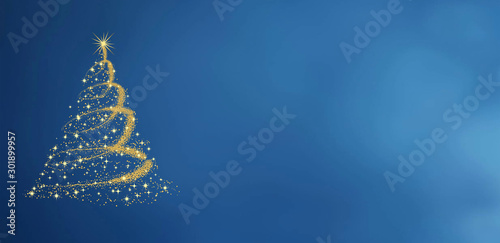 During the winter months of December celebration in the golden gift merry Christmas tree image of a star on the blue color background texture of  objects. for pattern photo
