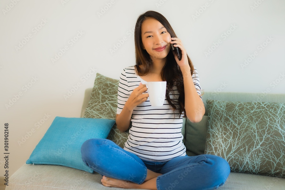 Portrait beautiful young asian woman using or talking mobile phone Portrait beautiful young asian woman using or talking mobile phone