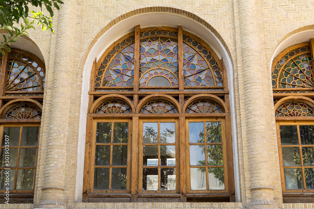 Renovated wooden arch windows, Masoudieh historic mansion from Qajar dynasty, built in 1879, Tehran, Iran