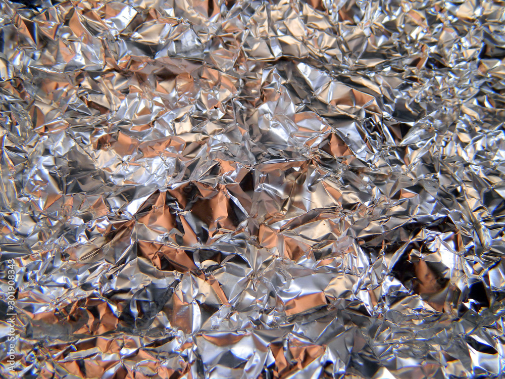 crumpled foil isolated on black background crumpled foil isolated on black background