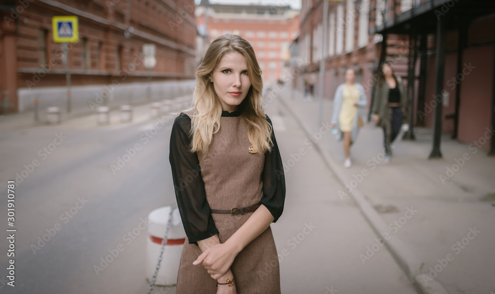 Street portrait of beautiful young woman.