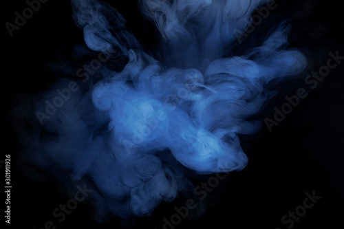 Abstract realistic soft blue smoke , fog , vapor on black background.