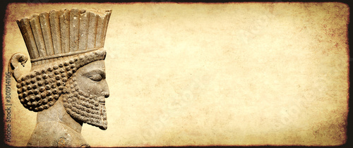 Fotografiet Grunge background with paper texture and head of persian warrior