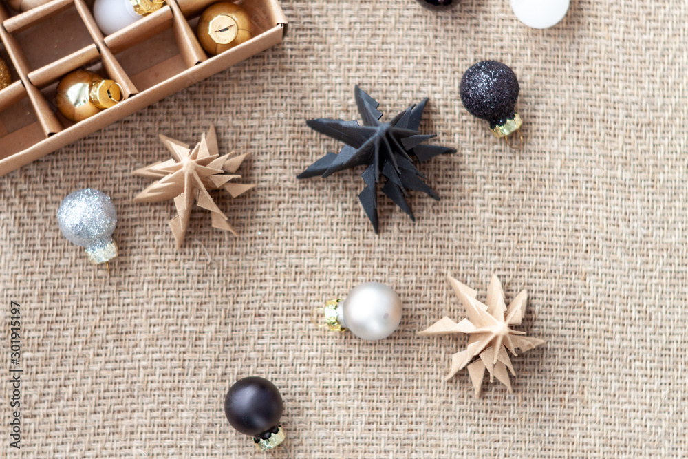 Close up glossy christmas balls with a paper christmas trees Close up glossy christmas balls with a paper christmas trees