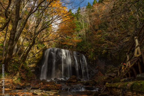 Tatsuzawafudo waterfall in autumn Fall season at Fukushima. There is the waterfall in inawashiro, Fukushima, Japan. photo