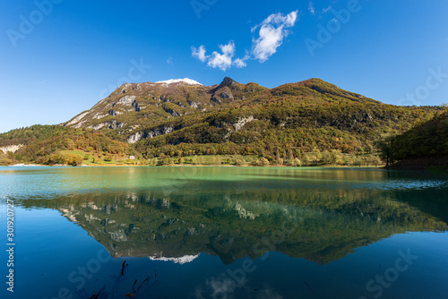 Lago di Tenno, small and beautiful lake in Italian alps (Monte Misone), Trento province, Trentino-Alto Adige, Italy, Europe photo