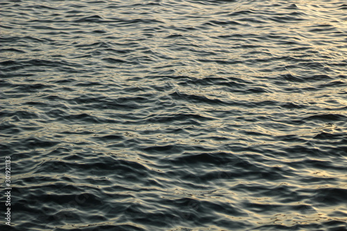 Creative background: ripples on the water, selective focus