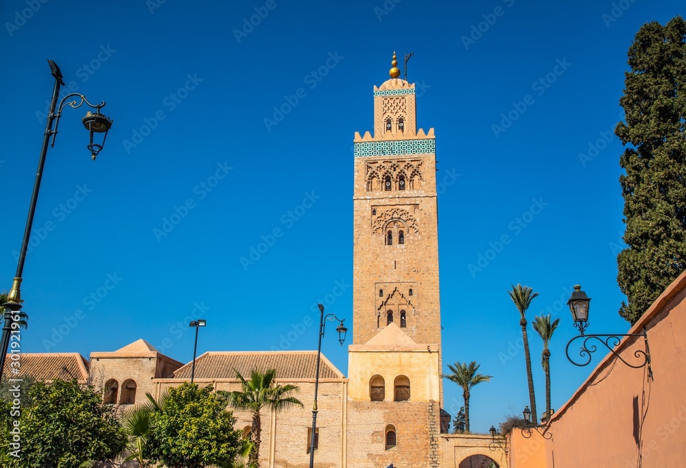 view of Koutoubia Mosque (Kutubiyya or Jami' al-Kutubiyah Mosque) the largest mosque located in the medina quarter of Marrakesh, Morocco