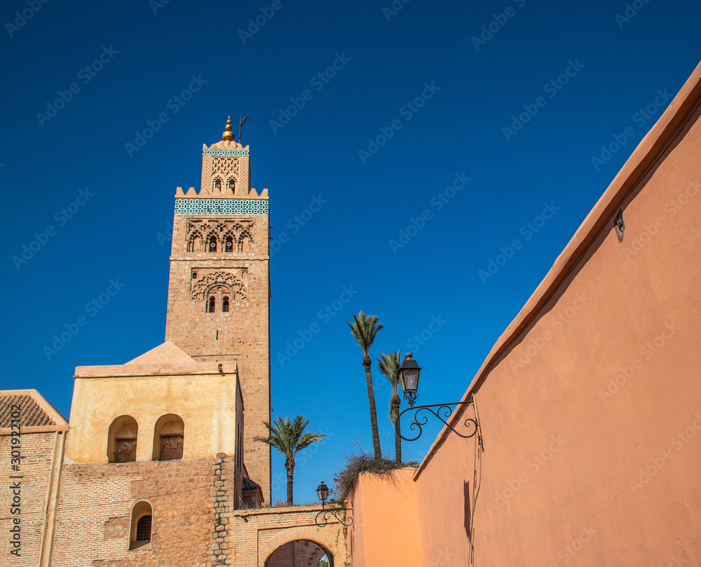 view of Koutoubia Mosque (Kutubiyya or Jami' al-Kutubiyah Mosque) the largest mosque located in the medina quarter of Marrakesh, Morocco