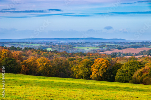 Autumn view of the high weald and the distant south downs in East Sussex from Tent Hill