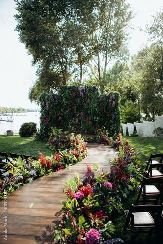 Amazing wedding ceremony place with flowers decoration