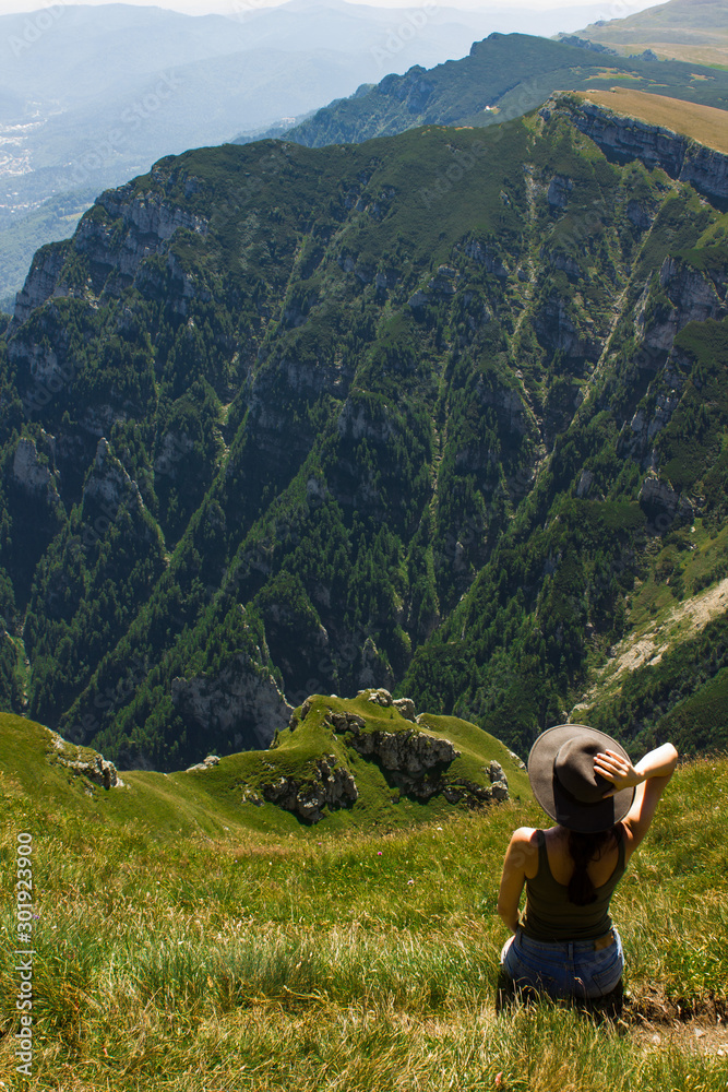 woman on top of mountain