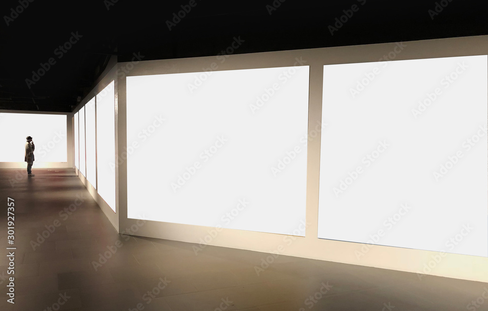 Perspective view of empty white space for advertisement or gallery photos line in pattern with a single man dress like artist stand and look at the first photo for mock up or use as template Perspective view of empty white space for advertisement or gallery photos line in pattern with a single man dress like artist stand and look at the first photo for mock up or use as template