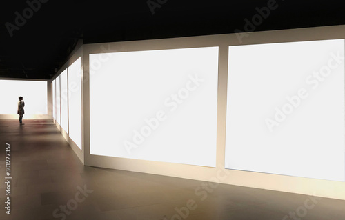 Perspective view of empty white space for advertisement or gallery photos line in pattern with a single man dress like artist stand and look at the first photo for mock up or use as template 