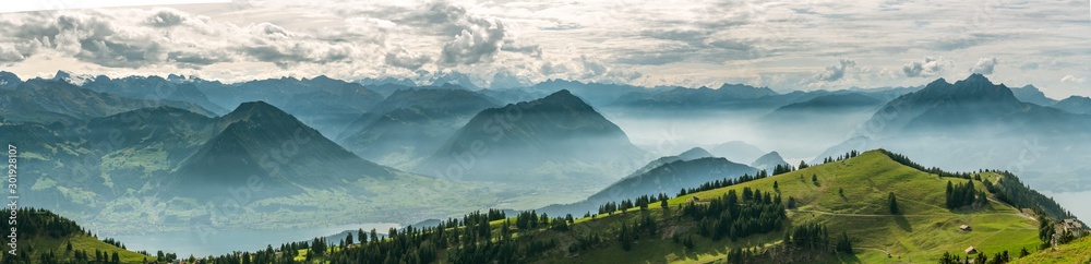 Beautiful panoramic view on Swiss Alps around Lake Lucerne as seen from top of Rigi Kulm peak