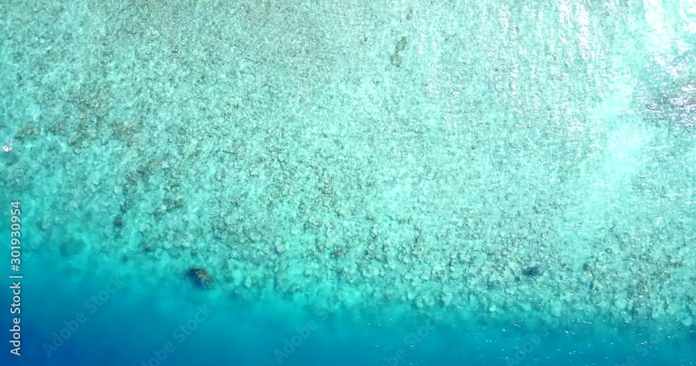 Beautiful Calm Seas With Sunlight Reflection in a Blue Turquoise Water in Florida - Aerial shot Beautiful Calm Seas With Sunlight Reflection in a Blue Turquoise Water in Florida - Aerial shot