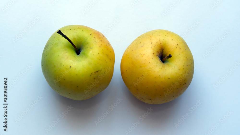 Organic yellow apple on a white background Organic yellow apple on a white background