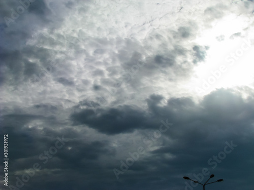 Wallpaper Mural The Pre-Storm Sky Is Covered with Dark Gray Cumulus Clouds Forming a Relief Texture Torontodigital.ca