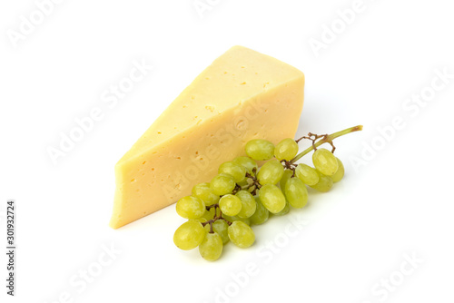 Cheese and green grape isolated on white background.
