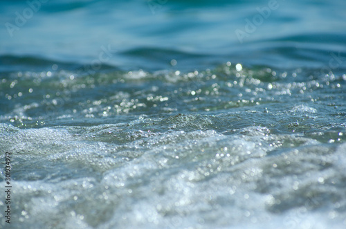 Fototapeta Naklejka Na Ścianę i Meble -  Soft wave of sea on sandy beach. Background.