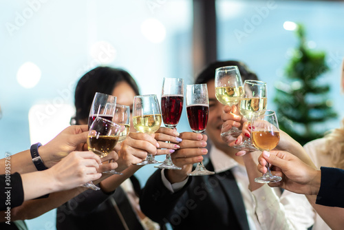 Business partners toast cha...