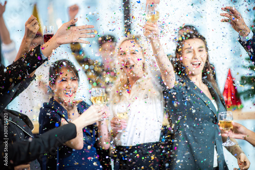Business partners toast cha...