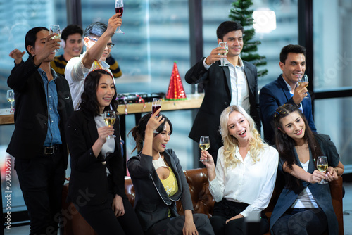 Business partners toast cha...