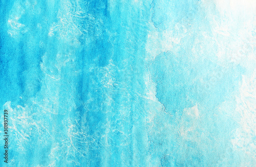 Abstract strokes of blue watercolor paint for the background