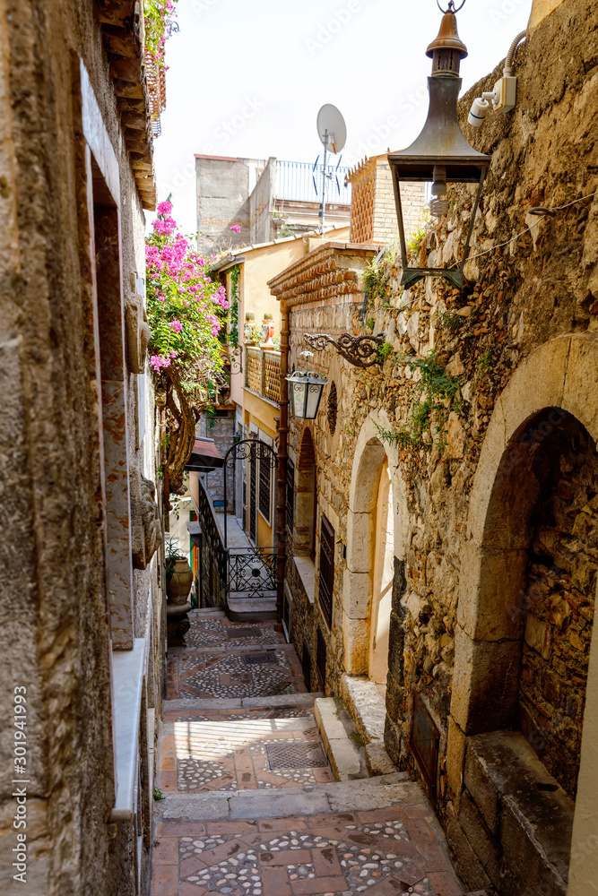 Beautiful old buildings, streets, stairs and alley ways in the town of Taormina, Cantania, Sicily, Italy