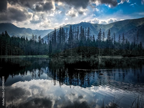 Mirror lake in the mountains