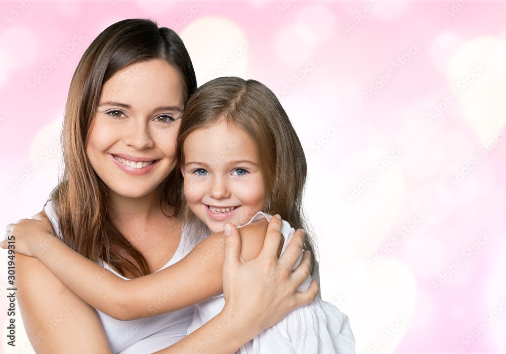 Happy Mother and daughter hugging Happy Mother and daughter hugging