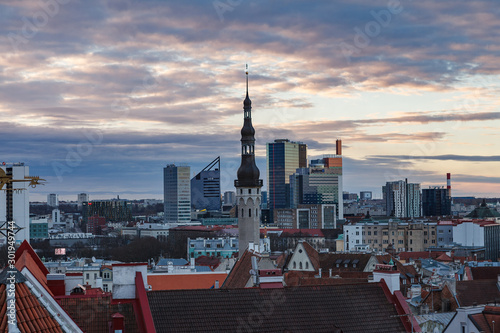 TALLINN, ESTONIA - APRIL, 25, 2018: View of red roofs and towers of old town at moody weather