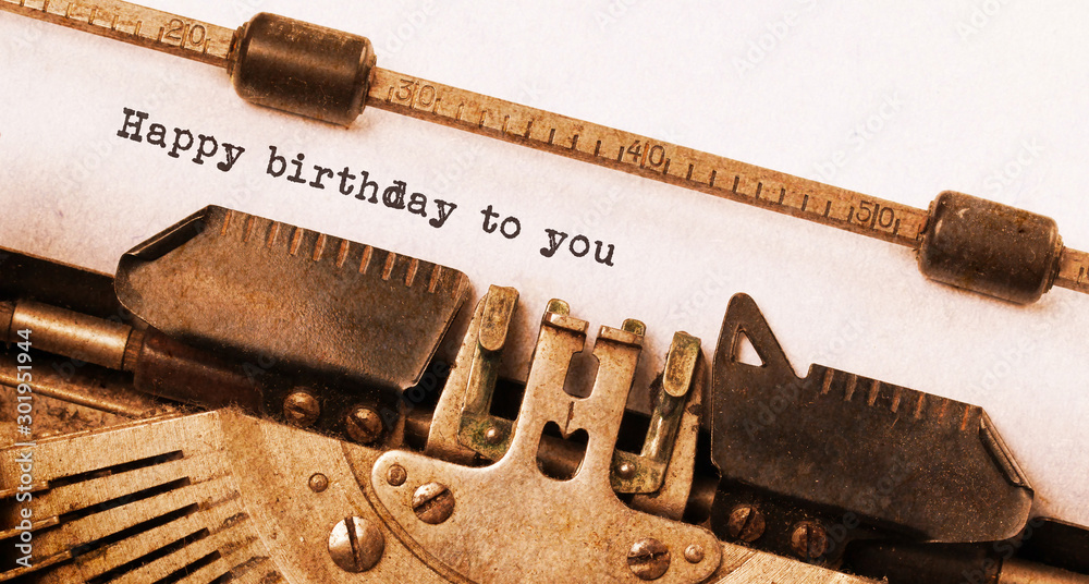 Happy birthday to you, written on an old typewriter - obrazy, fototapety, plakaty 